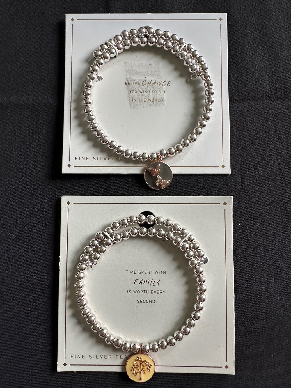 Silver plated NWT memory wire bracelet w/ rose goldtone charm. Choice of theme